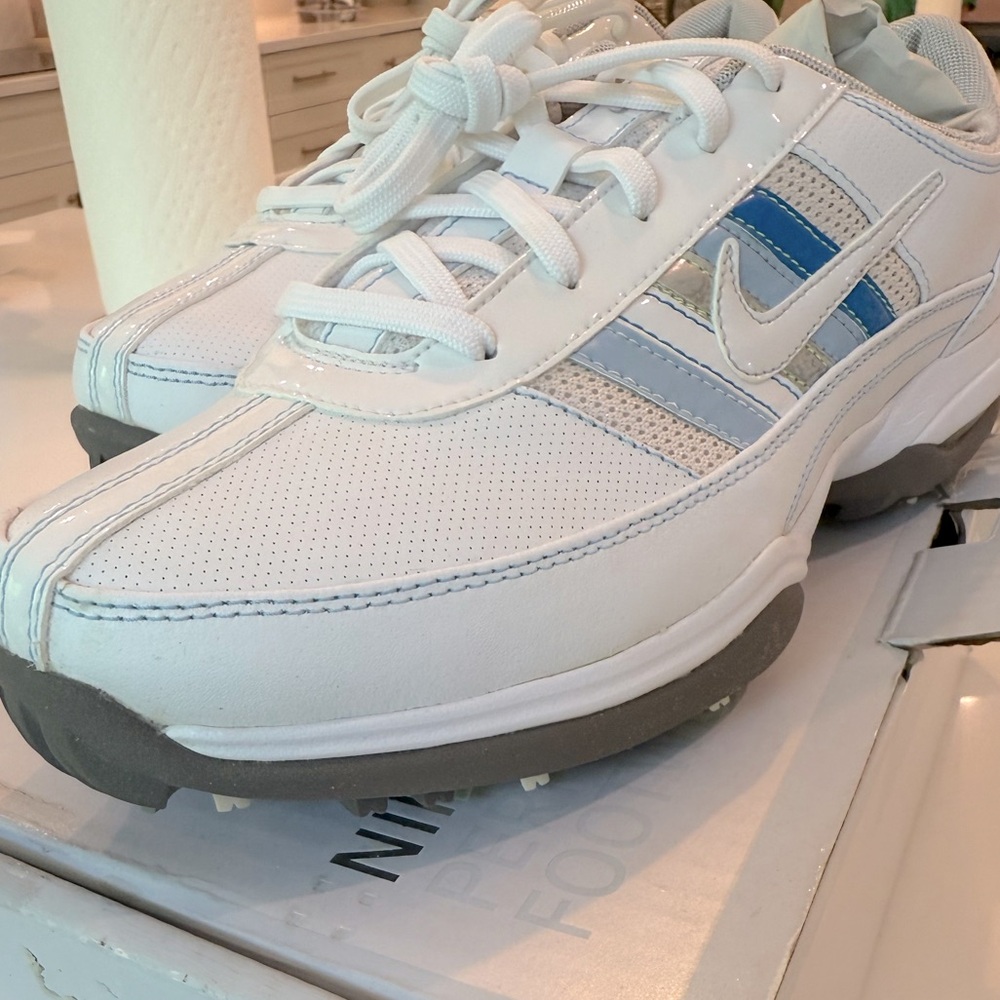 Women’s Nike Golf Shoe, six 8.5. White and Blue Athletic Shoes